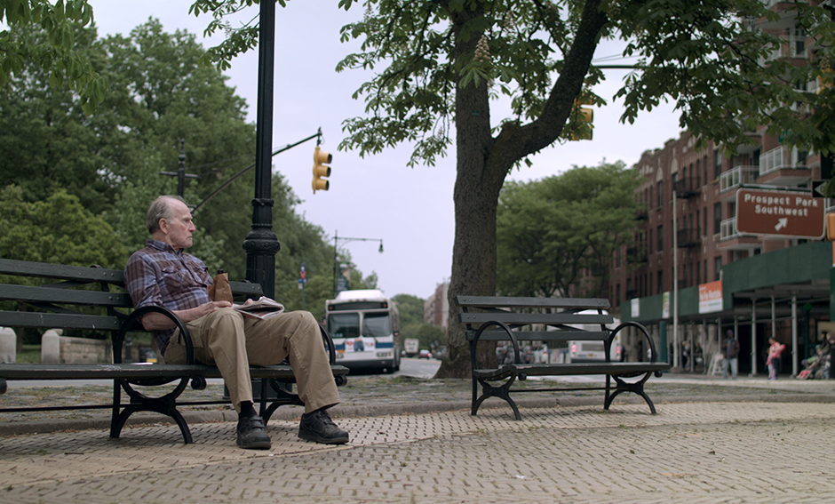 man sitting on bench