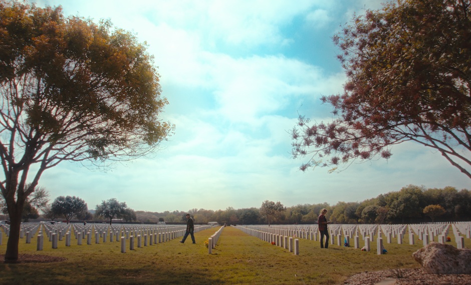 two people in military cemetery